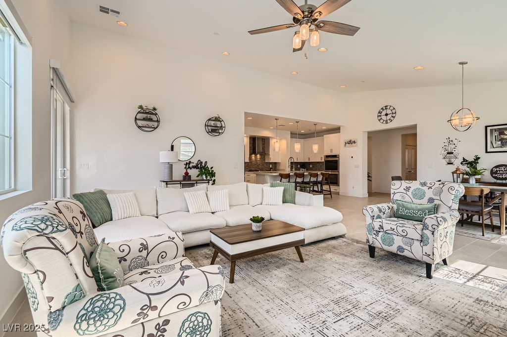 130 West Fairway Road Henderson, NV 89015 - Photo 7 of 40 Living room featuring recessed lighting, ceiling fan, and lofted ceiling