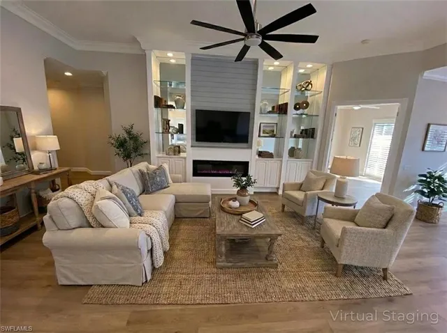an aerial view of lake residential house with swimming pool and outdoor seating