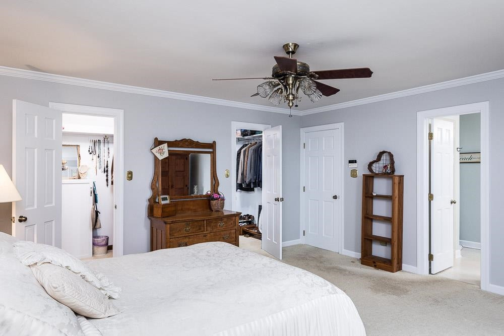 9513 Springdale Drive Raleigh, NC 27613 - Photo 15 of 30 Twin Walk-in Closets