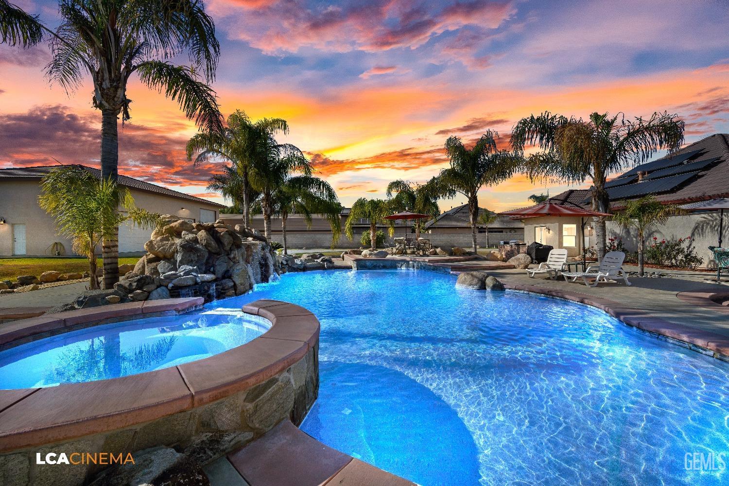 Undisclosed Address Bakersfield, CA 93314 - Photo 11 of 71 a swimming pool with outdoor seating and yard
