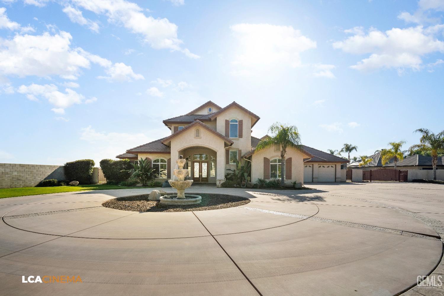 Undisclosed Address Bakersfield, CA 93314 - Photo 18 of 71 a front view of a house with a yard and trees