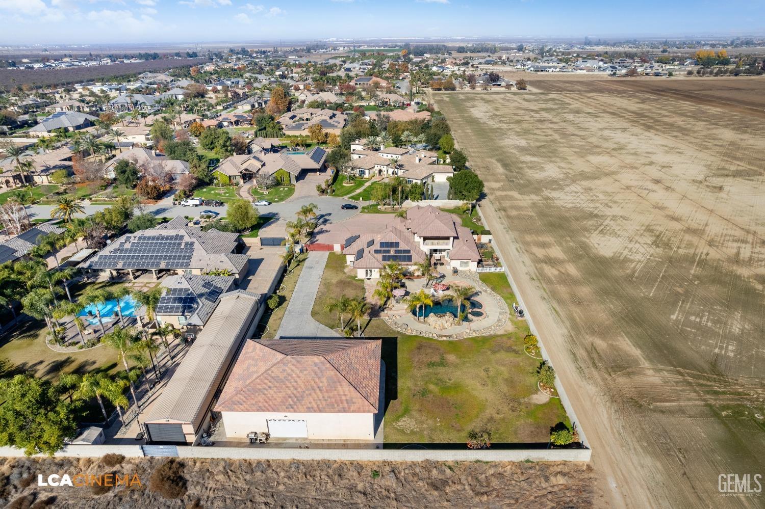 Undisclosed Address Bakersfield, CA 93314 - Photo 24 of 71 an aerial view of residential houses with outdoor space