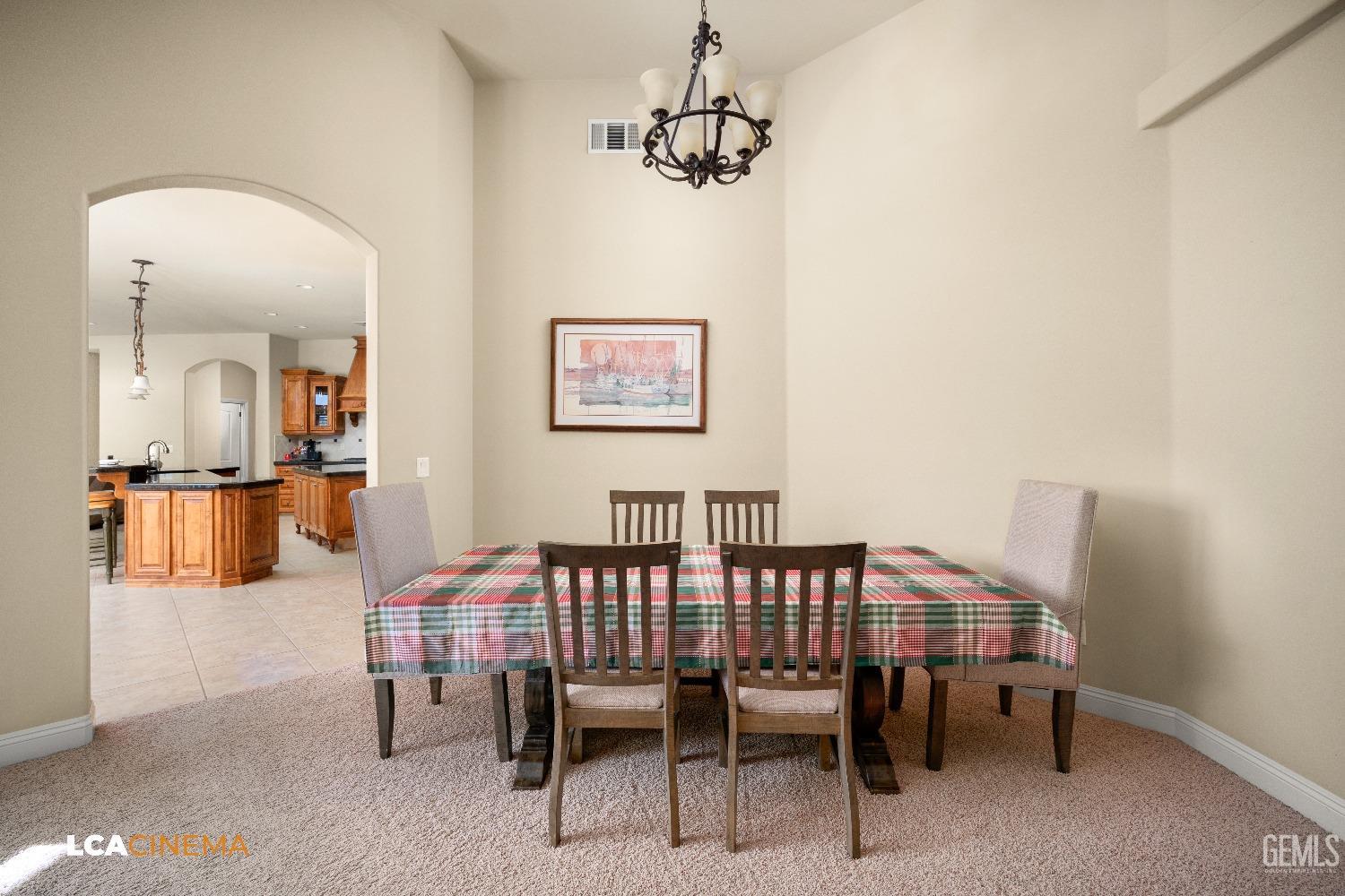 Undisclosed Address Bakersfield, CA 93314 - Photo 33 of 71 a view of a dining room with furniture