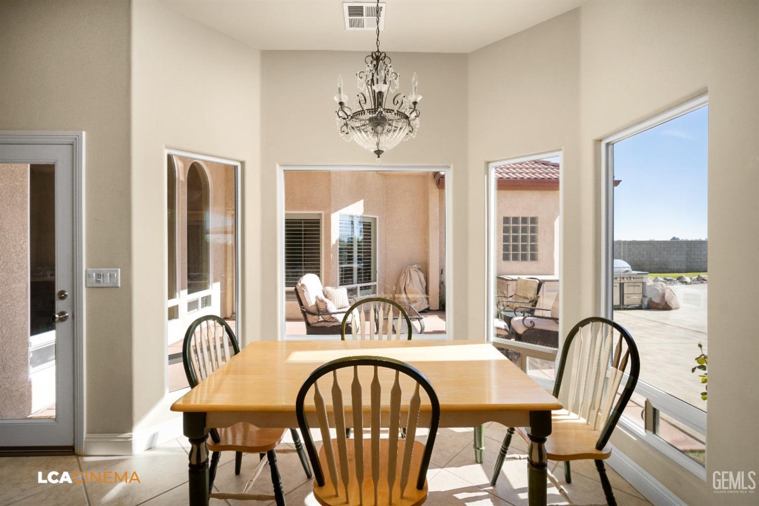 Undisclosed Address Bakersfield, CA 93314 - Photo 35 of 71 a view of a a dining room with furniture window and outside view