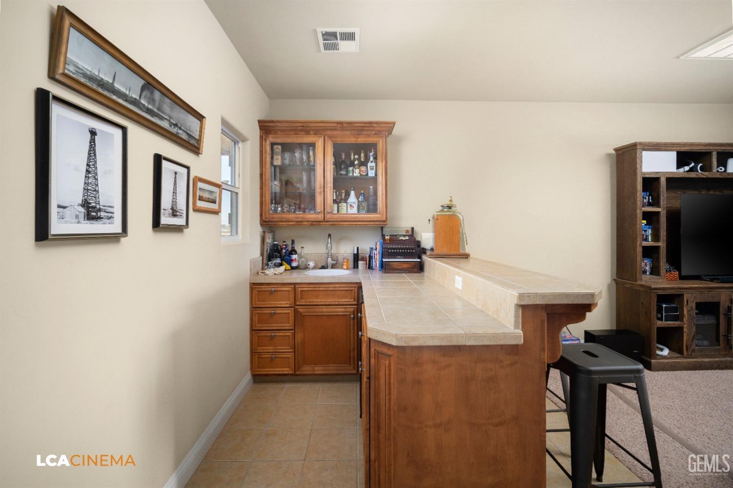 Undisclosed Address Bakersfield, CA 93314 - Photo 54 of 71 a kitchen with stainless steel appliances granite countertop a refrigerator and a stove top oven