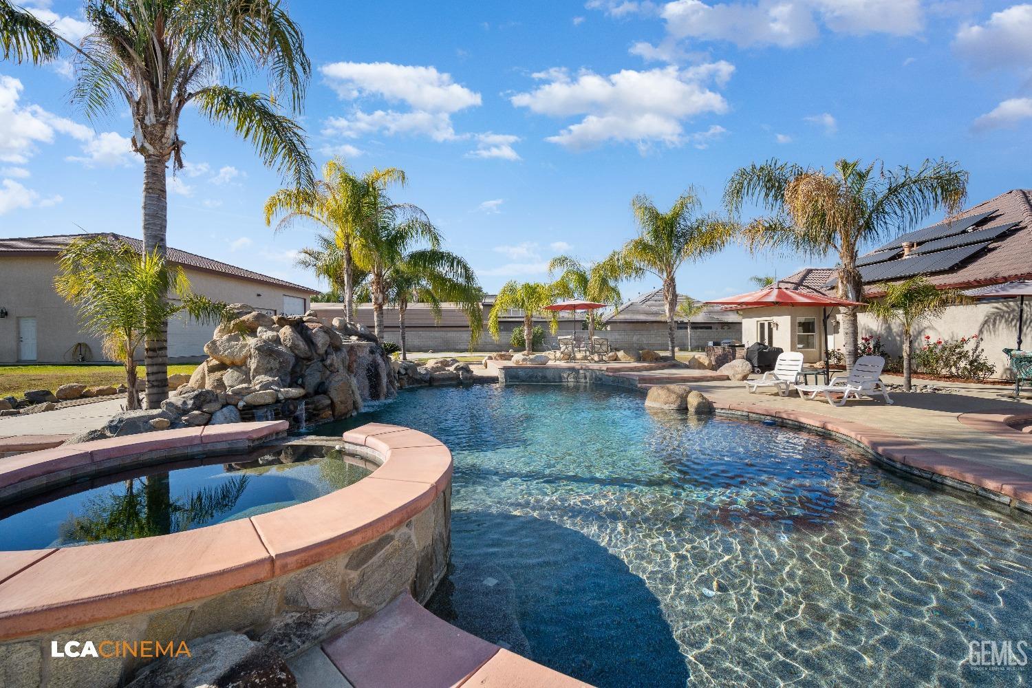 Undisclosed Address Bakersfield, CA 93314 - Photo 64 of 71 a view of a swimming pool with a patio