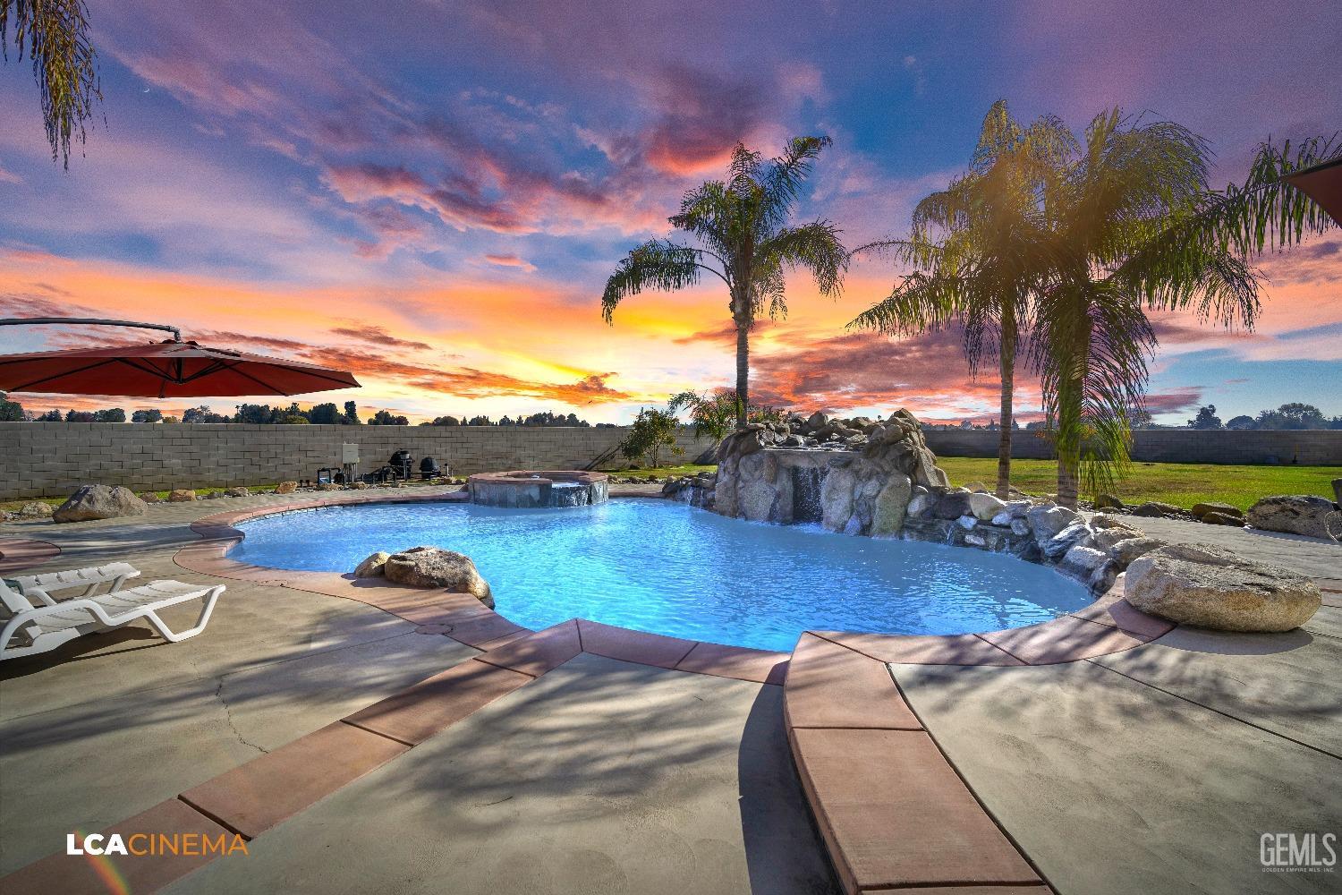 Undisclosed Address Bakersfield, CA 93314 - Photo 8 of 71 a view of a swimming pool with an outdoor seating