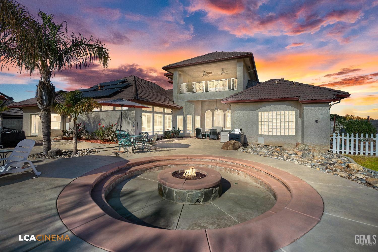 Undisclosed Address Bakersfield, CA 93314 - Photo 10 of 71 a view of a house with swimming pool and sitting area