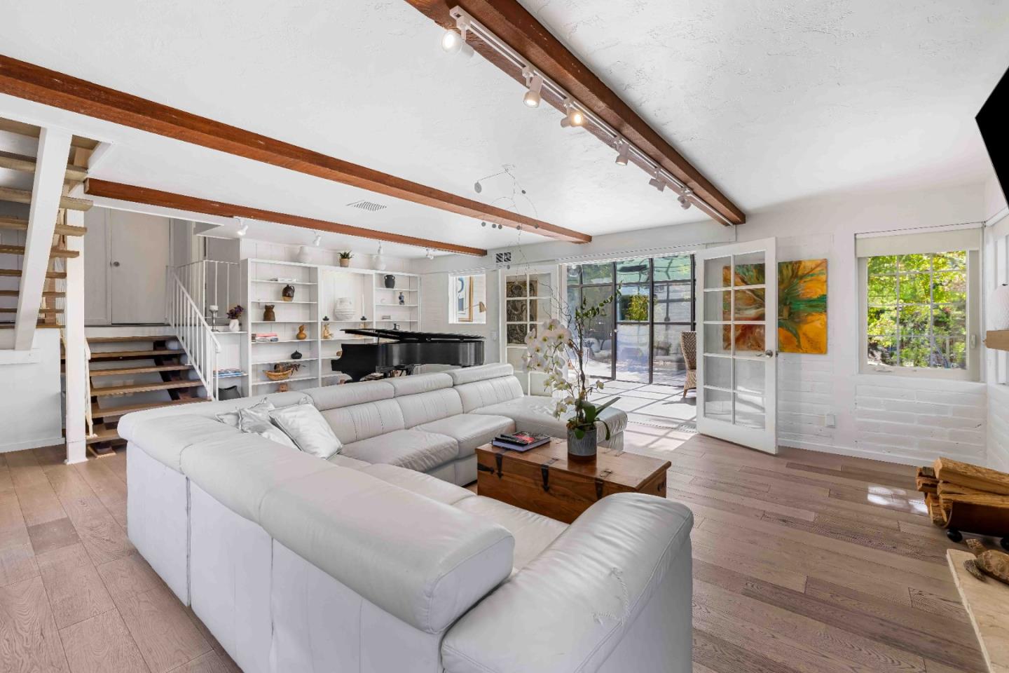 1268 Viscaino Road Pebble Beach, CA 93953 - Photo 13 of 47 a living room with furniture and a large window