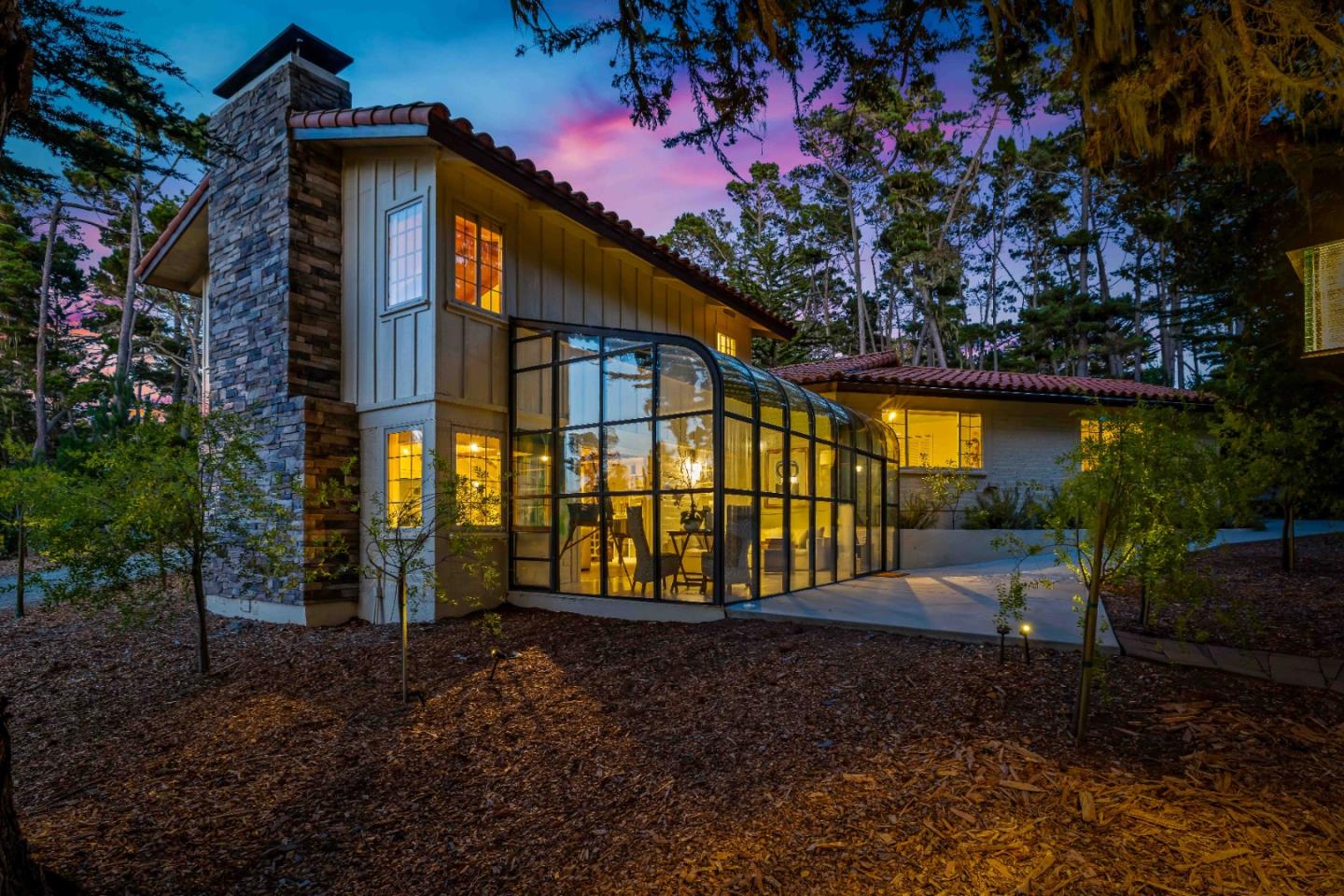 1268 Viscaino Road Pebble Beach, CA 93953 - Photo 16 of 47 a view of a house with a yard