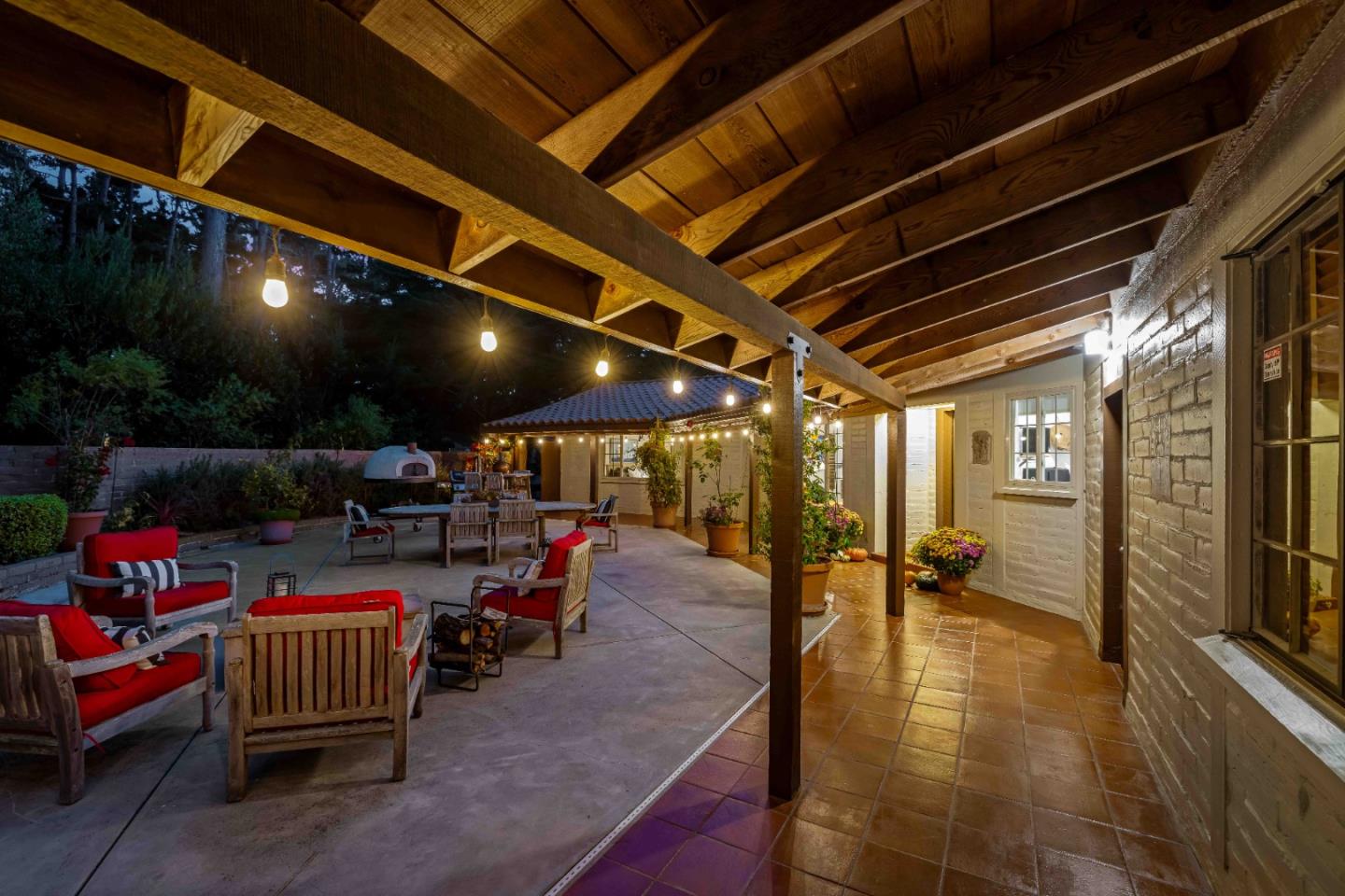 1268 Viscaino Road Pebble Beach, CA 93953 - Photo 4 of 47 a outdoor space with lots of furniture and a potted plant