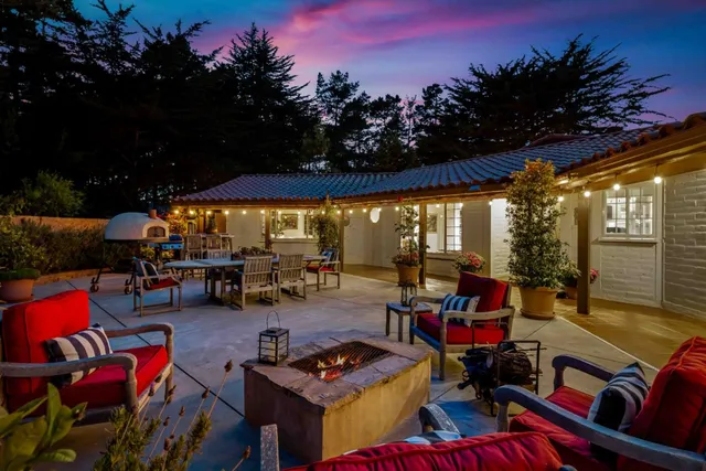 a view of a tables and chairs in patio
