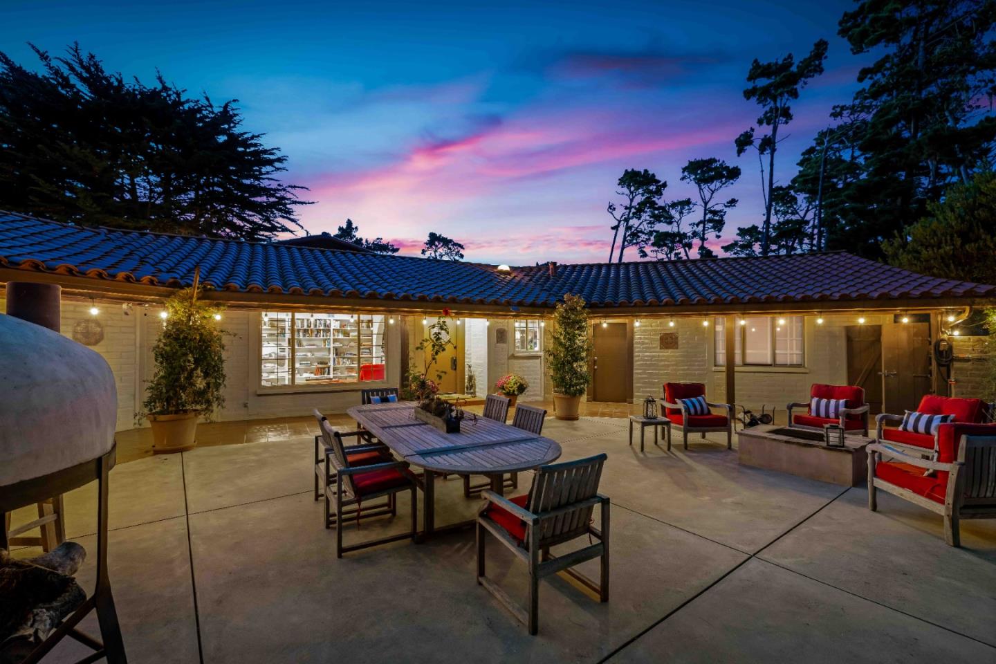 1268 Viscaino Road Pebble Beach, CA 93953 - Photo 6 of 47 a view of a tables and chairs in patio
