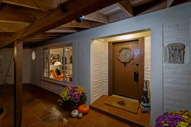 a view of a livingroom with shelves