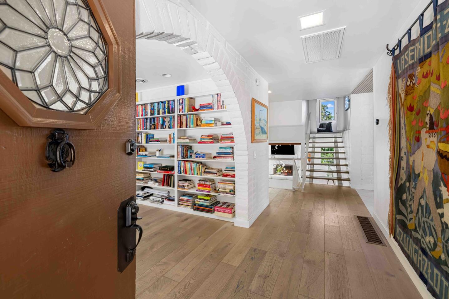 1268 Viscaino Road Pebble Beach, CA 93953 - Photo 8 of 47 a view of a livingroom with shelves
