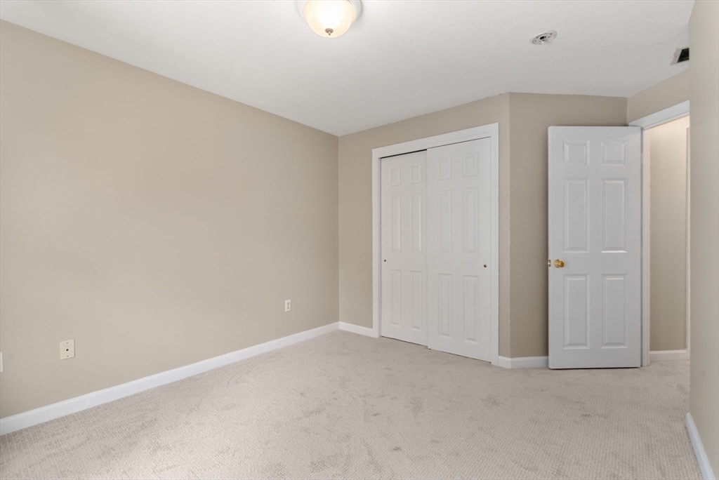 33 Fuller Avenue, Unit 33 Attleboro, MA 02703 - Photo 12 of 16 a view of an empty room