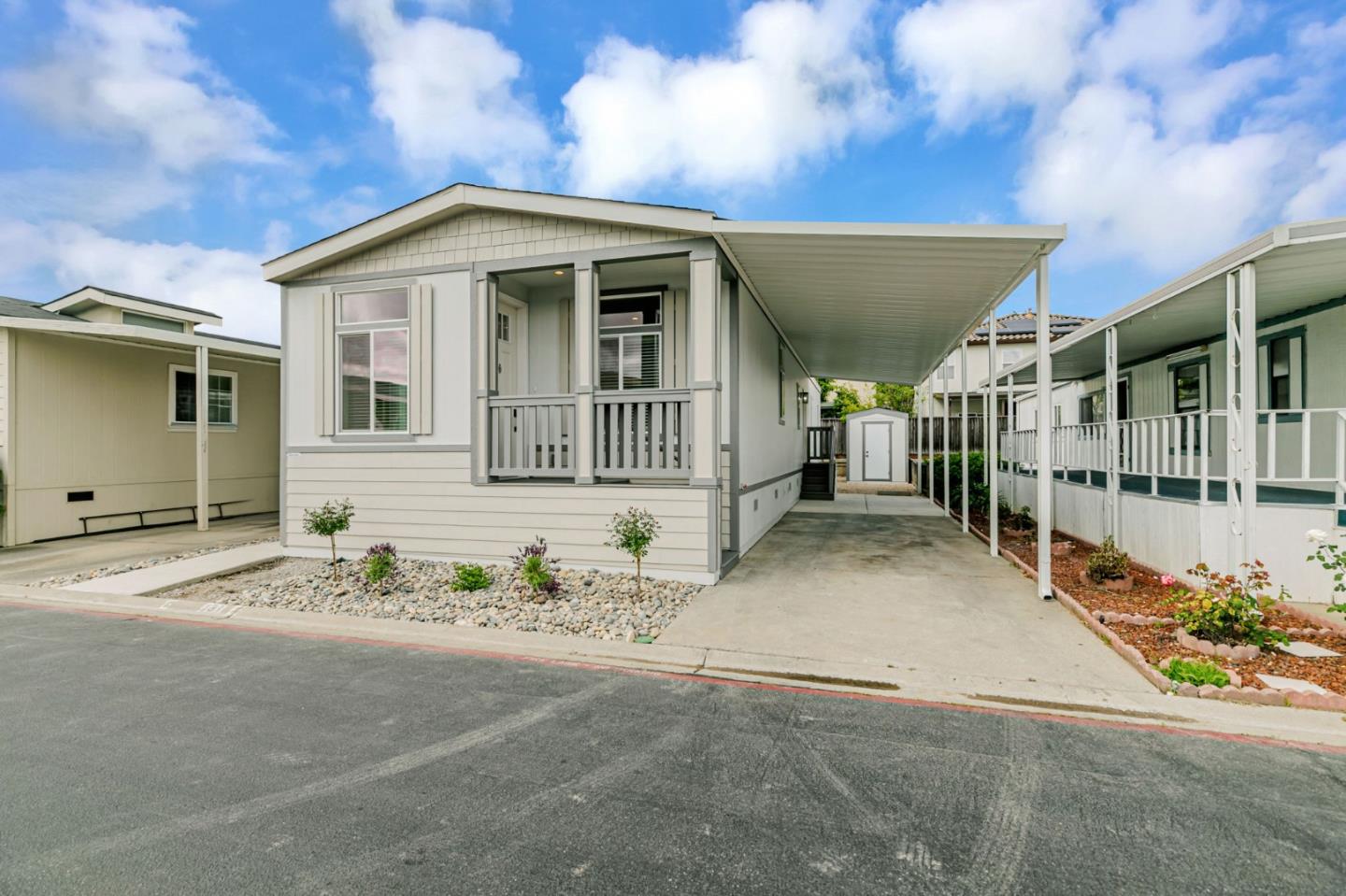 555 Umbarger Road, Unit 131 San Jose, CA 95111 - Photo 2 of 29 a front view of a house with a garage