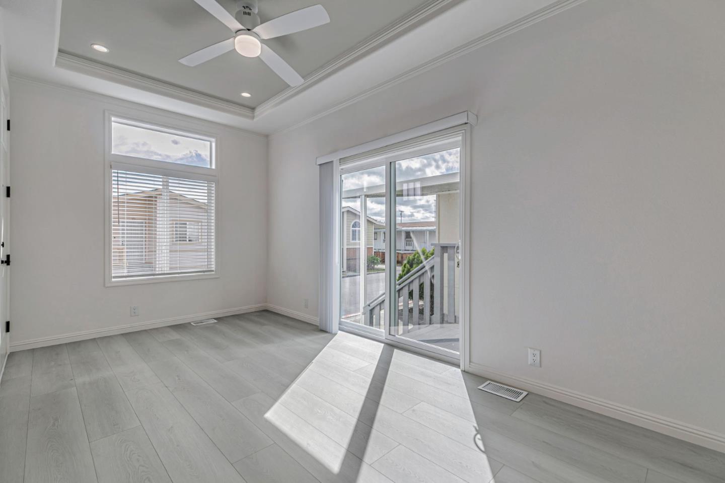 555 Umbarger Road, Unit 131 San Jose, CA 95111 - Photo 8 of 29 an empty room with windows