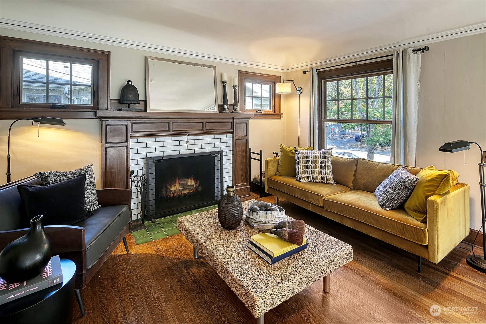 4715 Stone Way North Seattle, WA 98103 - Photo 6 of 30 a living room with furniture and a fireplace
