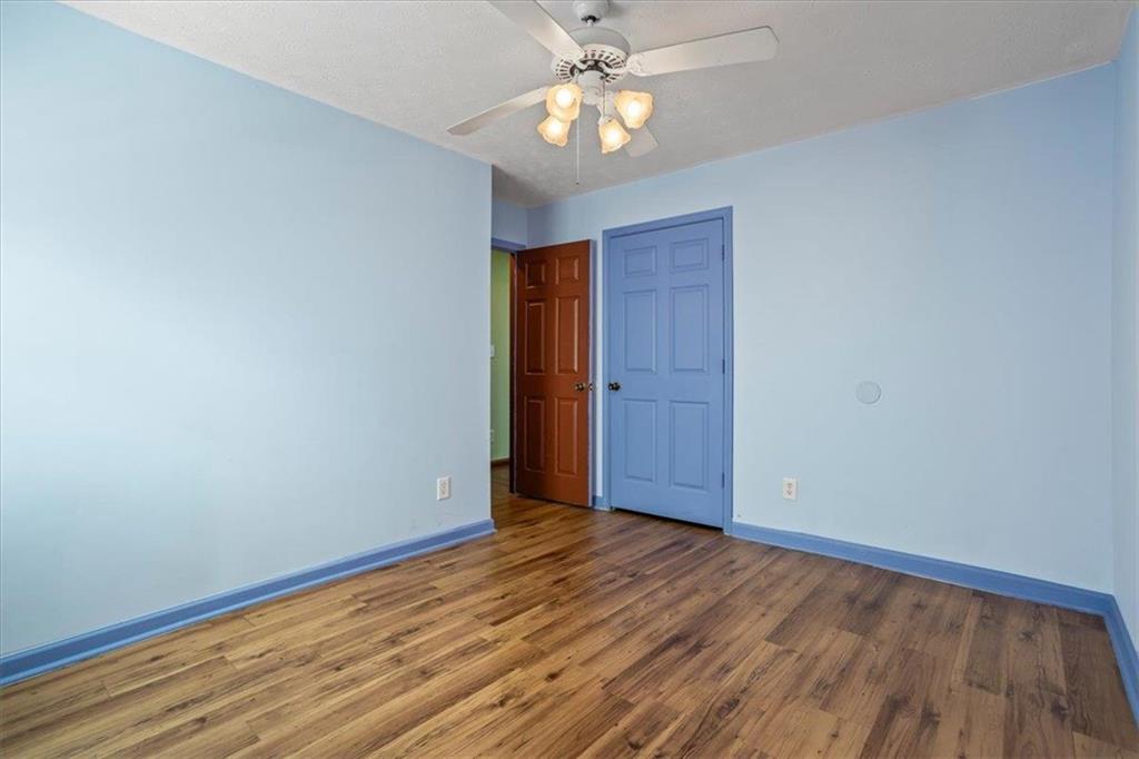150 Crystal Brook Griffin, GA 30223 - Photo 16 of 28 a view of empty room with wooden floor