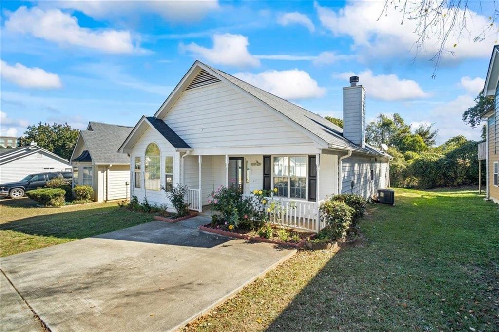 150 Crystal Brook Griffin, GA 30223 - Photo 20 of 28 a front view of a house with garden