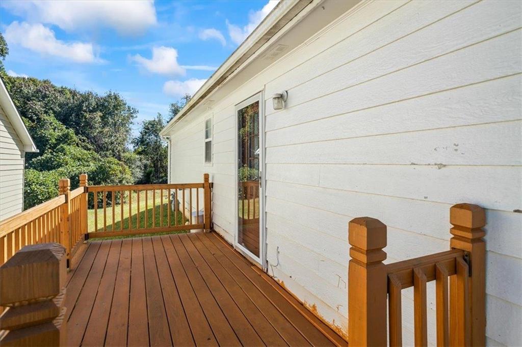 150 Crystal Brook Griffin, GA 30223 - Photo 22 of 28 a view of deck with wooden floor and fence