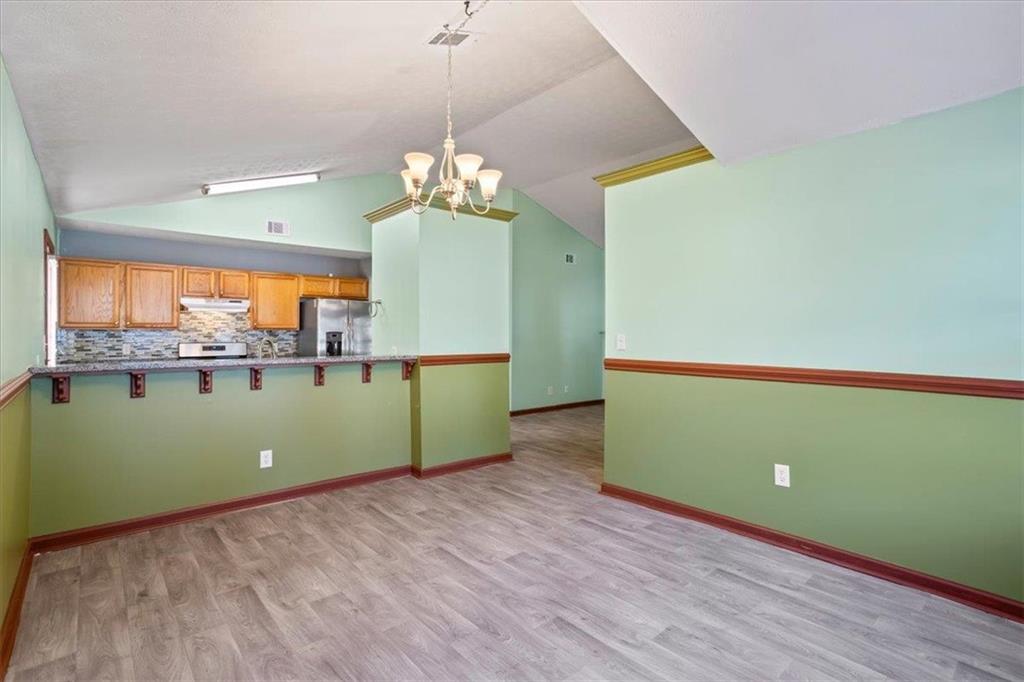 150 Crystal Brook Griffin, GA 30223 - Photo 7 of 28 a room with green walls and a window