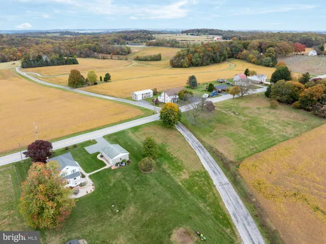 a view of a lake with a yard