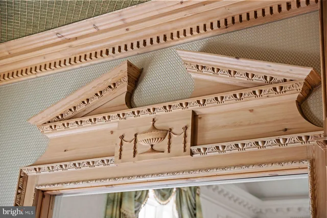 a living room with fireplace furniture and a window