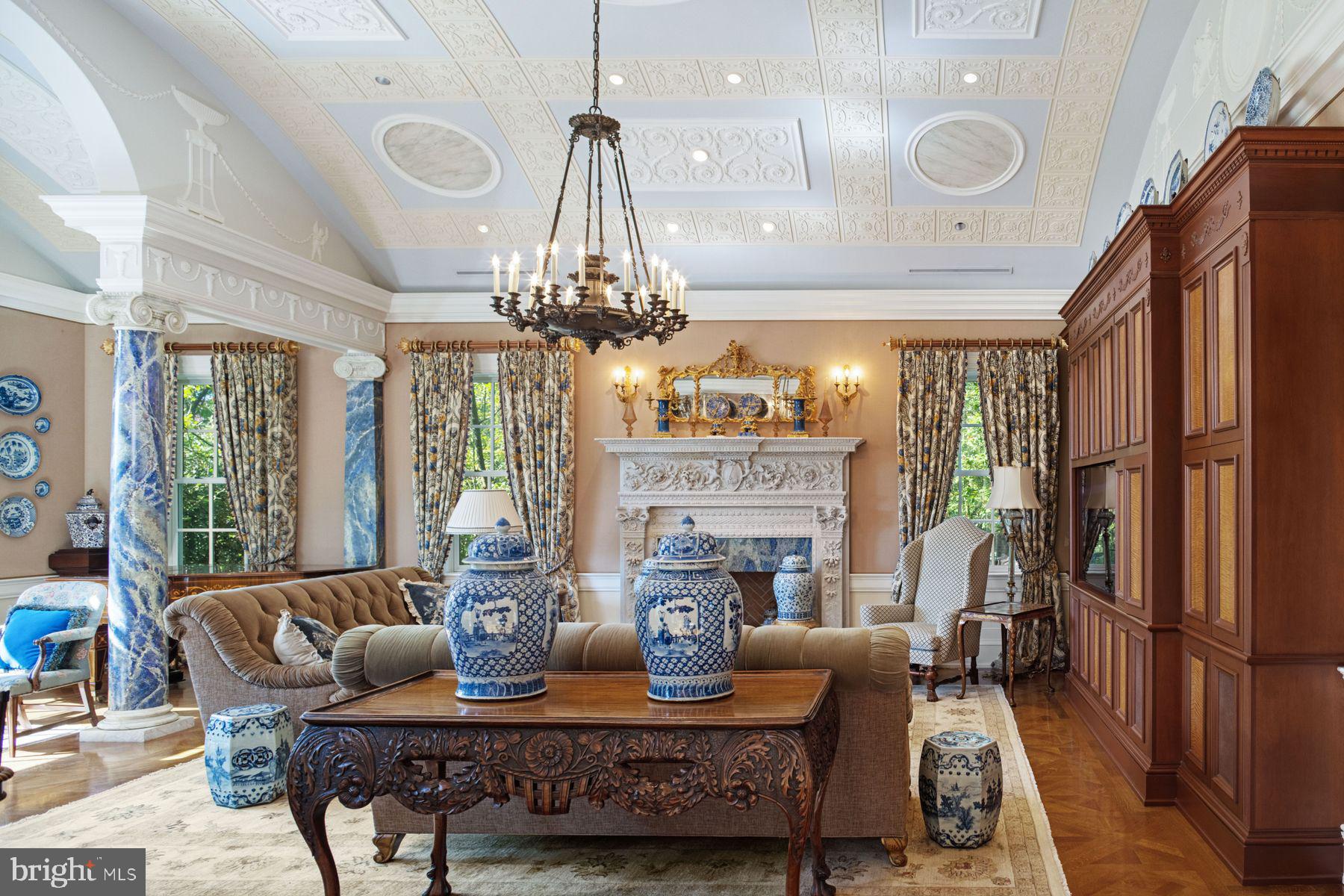 1534 North Trooper Road Norristown, PA 19403 - Photo 19 of 49 a living room with fireplace furniture and a chandelier