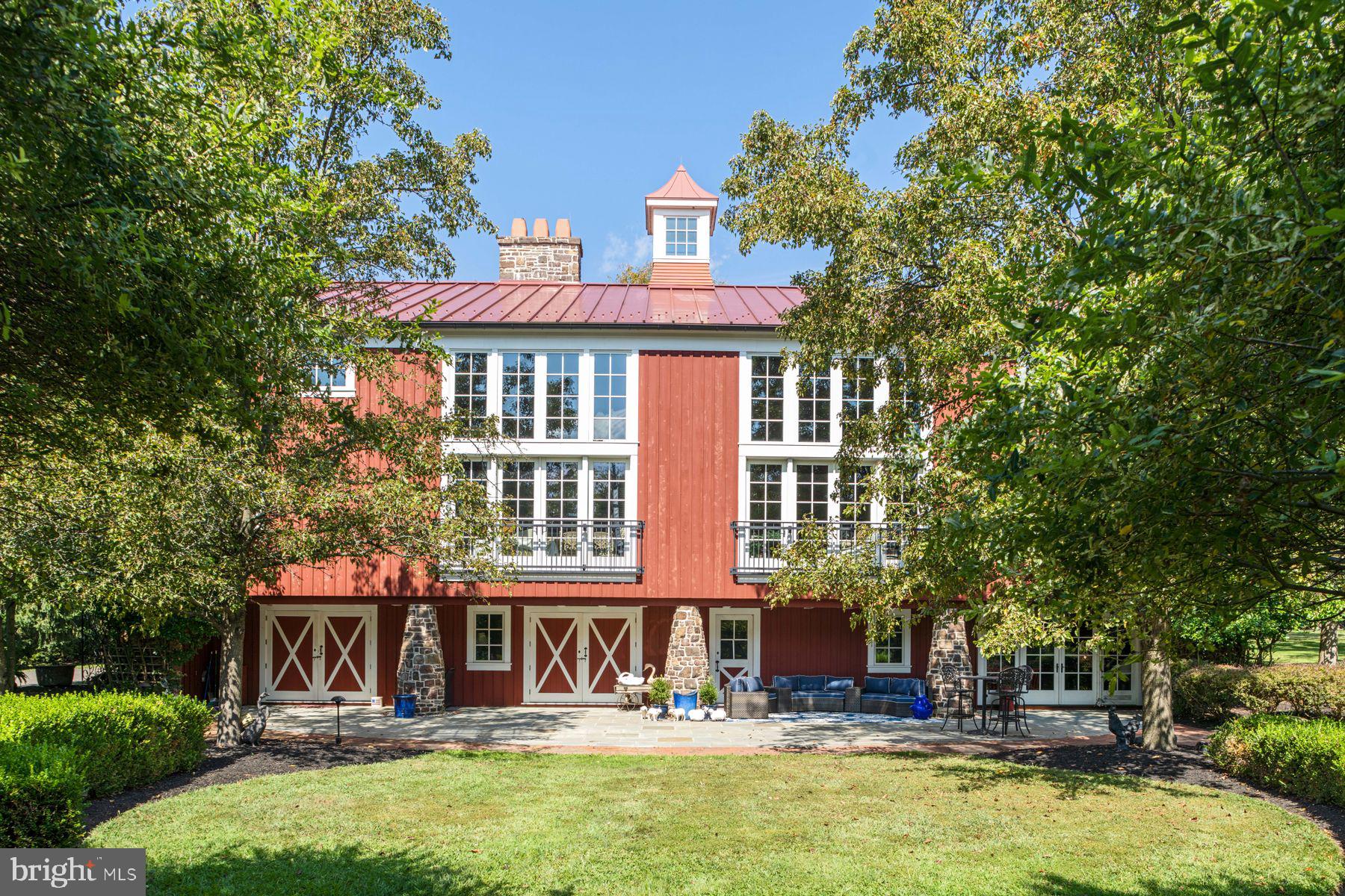 1534 North Trooper Road Norristown, PA 19403 - Photo 44 of 49 a front view of a residential apartment building with a yard