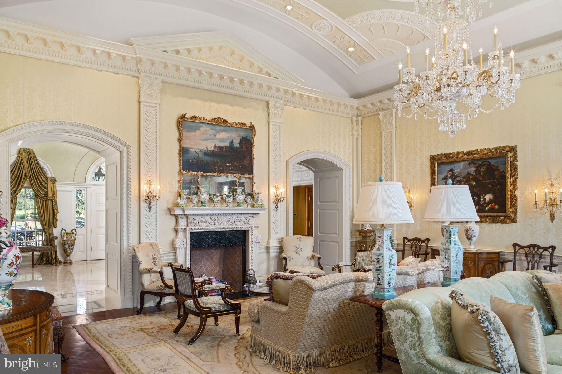 1534 North Trooper Road Norristown, PA 19403 - Photo 10 of 49 a living room with furniture a chandelier and a fireplace