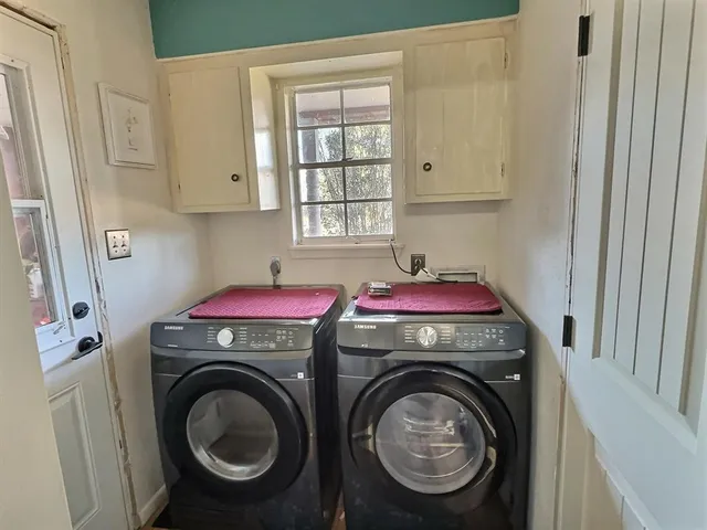 a utility room with dryer and washer