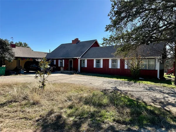 a house with trees in front of it