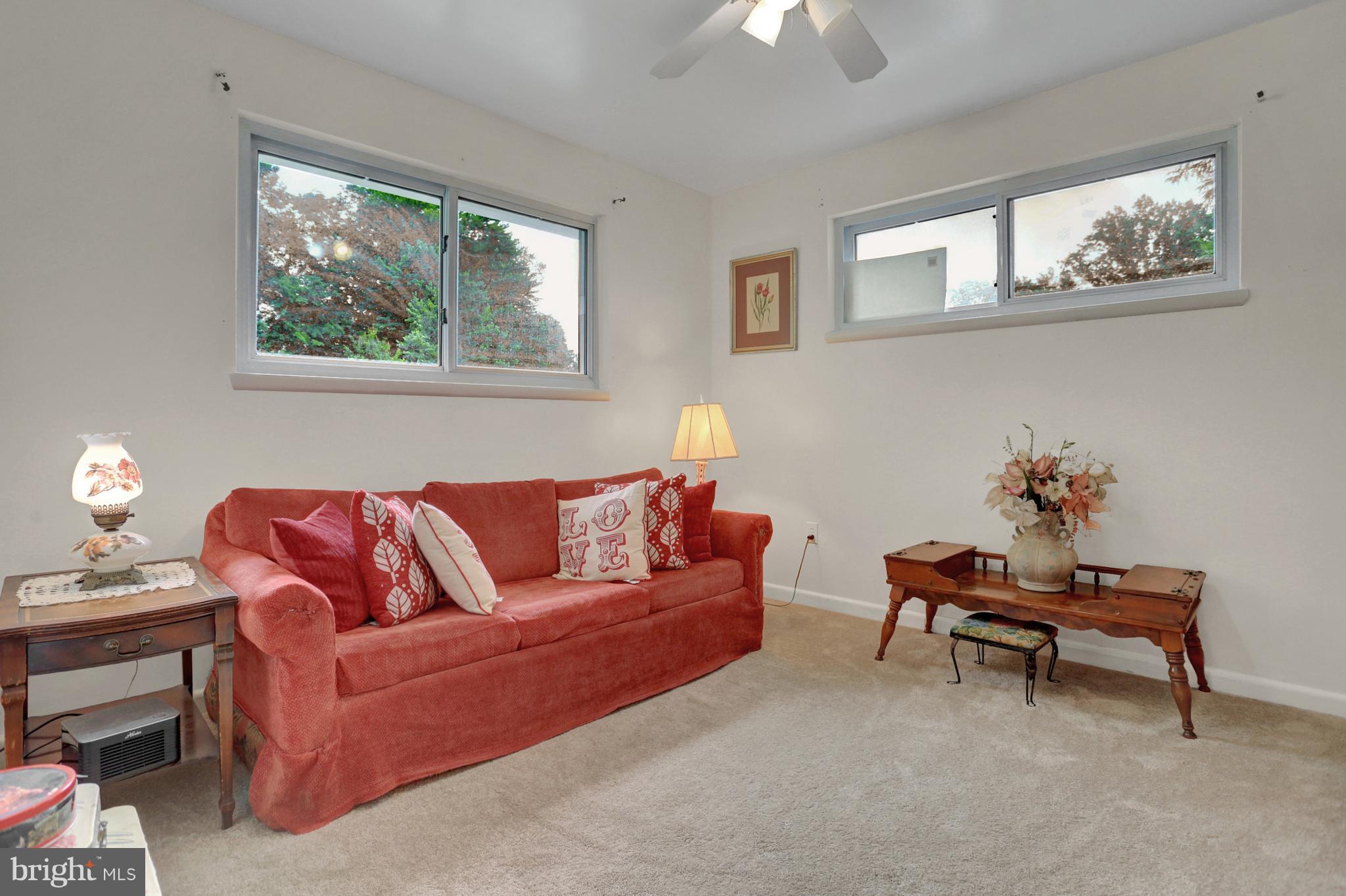 201 Belton Road Silver Spring, MD 20901 - Photo 12 of 24 a living room with furniture and a window
