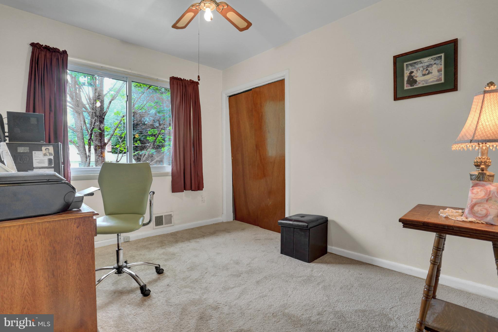 201 Belton Road Silver Spring, MD 20901 - Photo 13 of 24 a living room with furniture and a window
