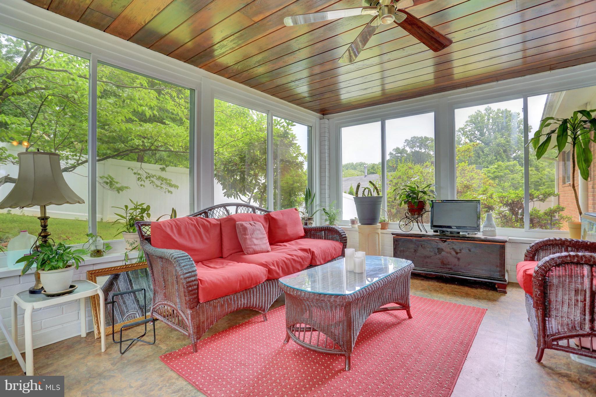 201 Belton Road Silver Spring, MD 20901 - Photo 19 of 24 a living room with furniture and a large window