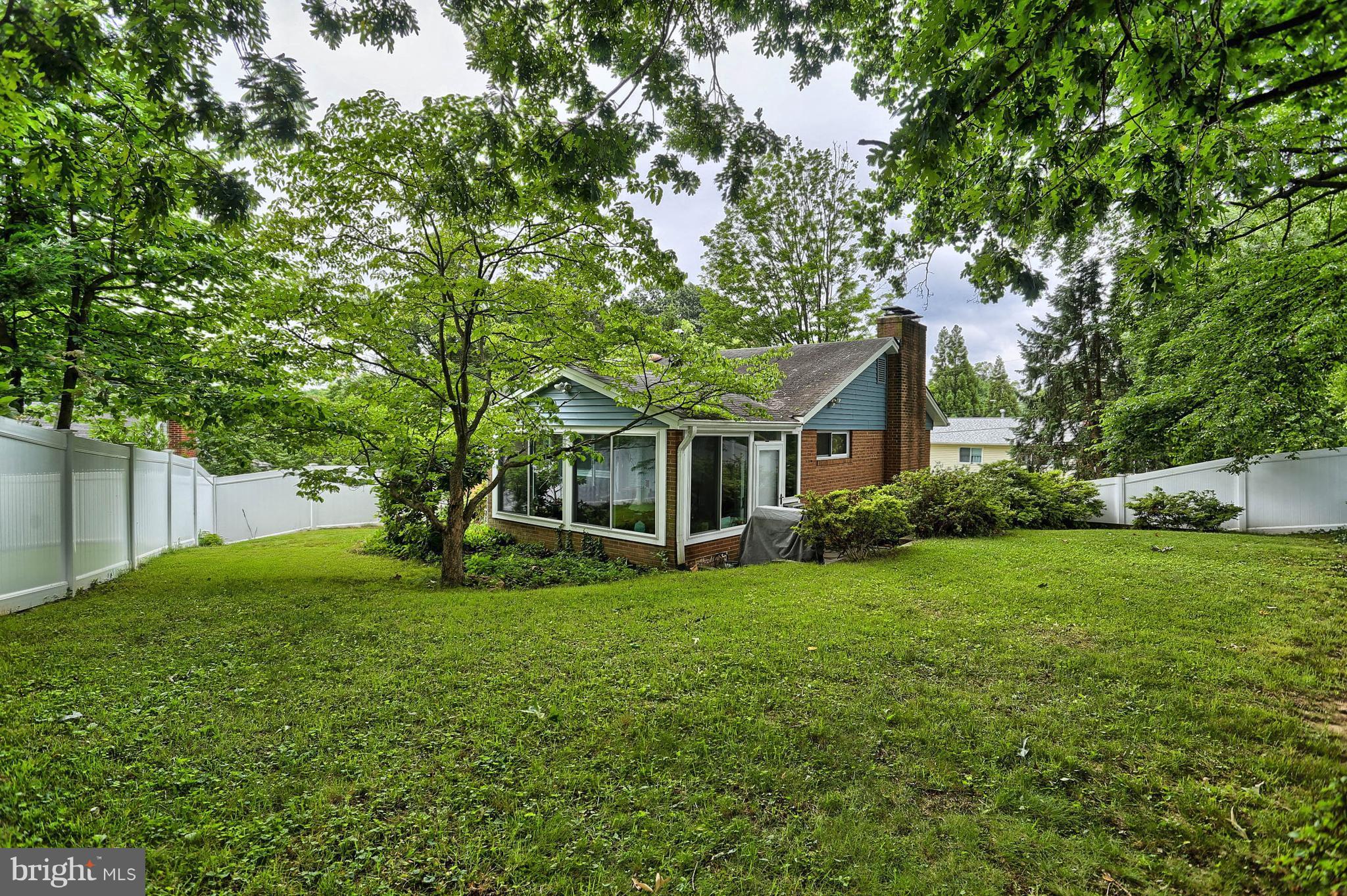 201 Belton Road Silver Spring, MD 20901 - Photo 23 of 24 a view of a house with a yard
