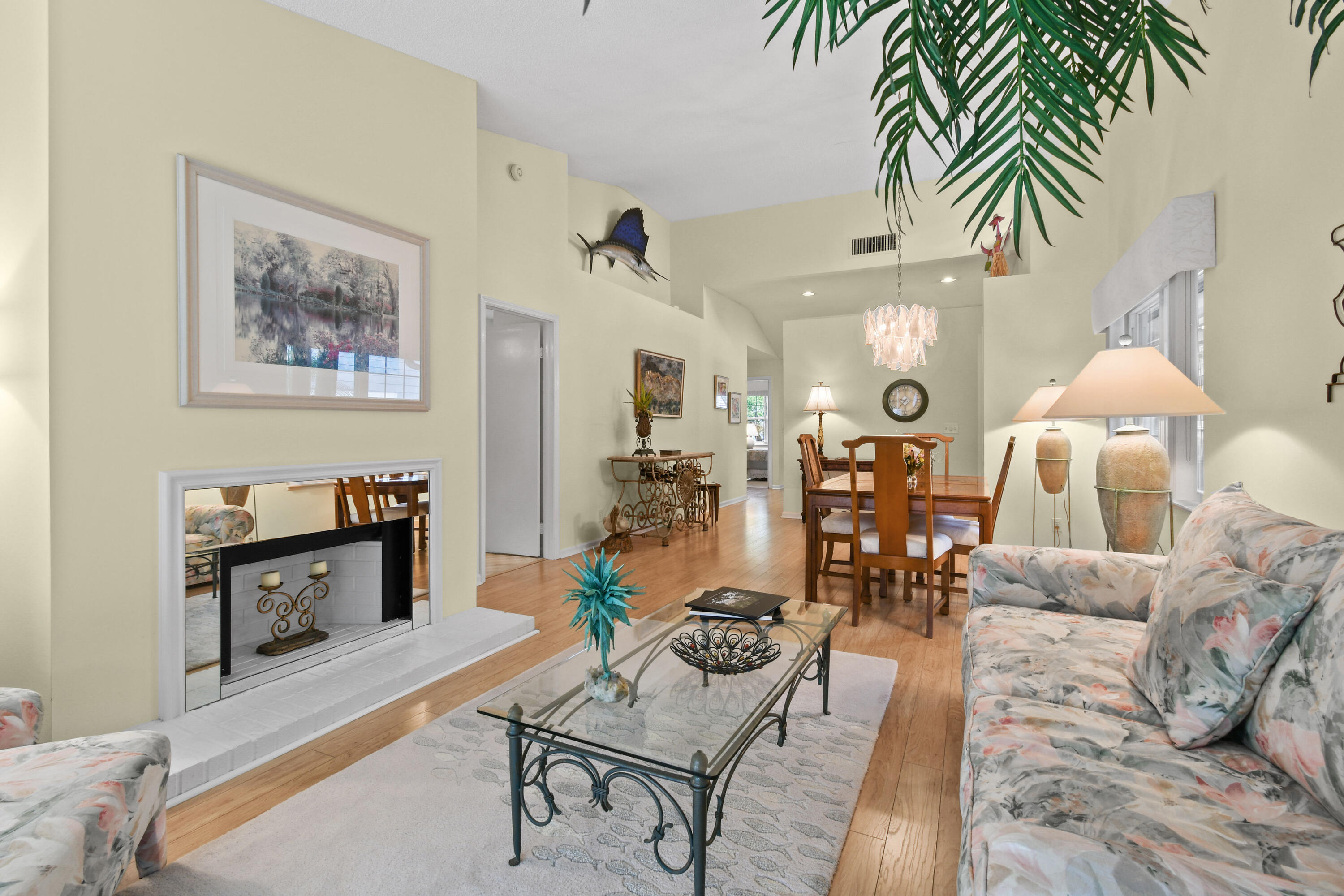 607 Ocean Dunes Circle Jupiter, FL 33477 - Photo 11 of 45 a living room with furniture and wooden floor