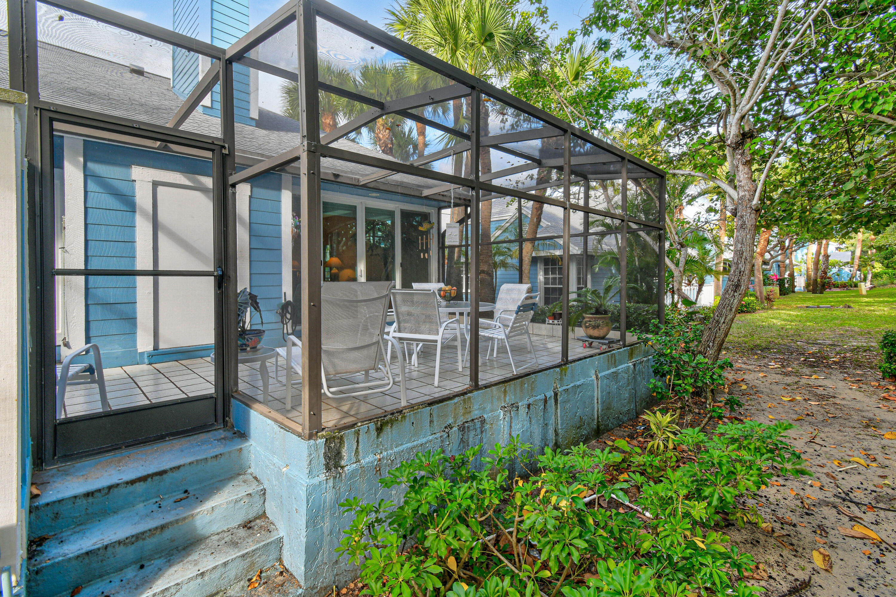 607 Ocean Dunes Circle Jupiter, FL 33477 - Photo 29 of 45 a view of a house with a yard balcony and sitting area