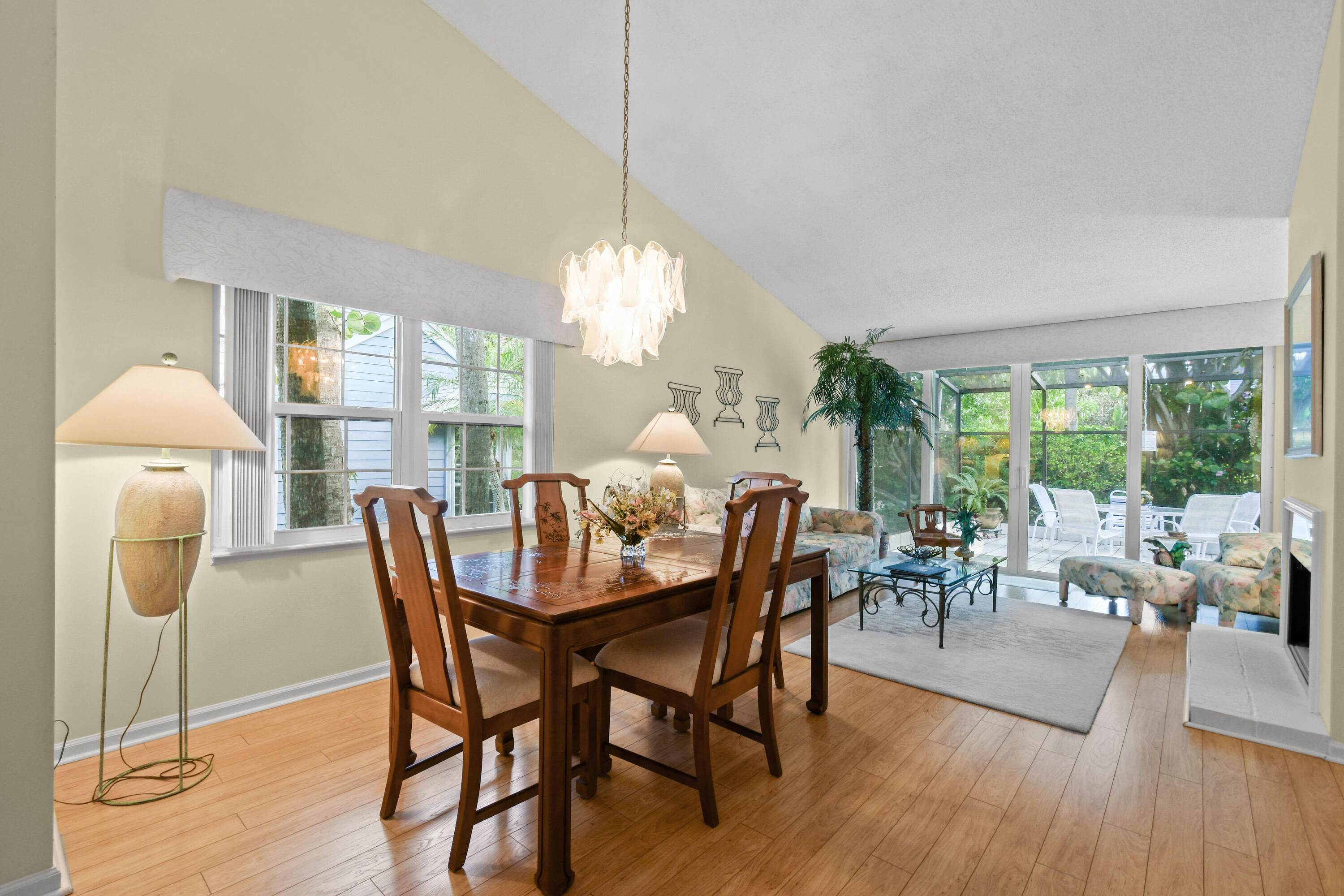 607 Ocean Dunes Circle Jupiter, FL 33477 - Photo 7 of 45 a view of a dining room with furniture window and wooden floor
