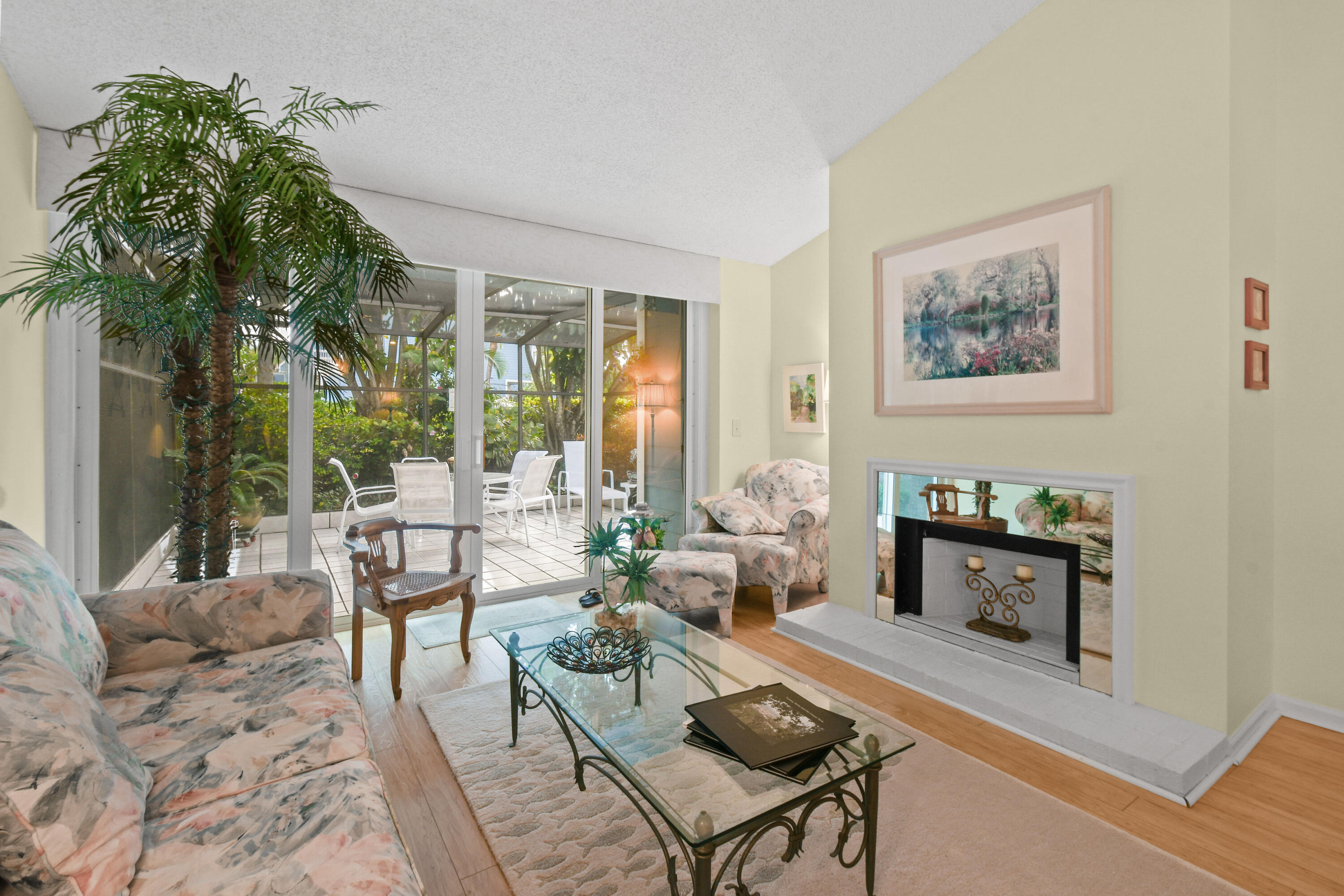 607 Ocean Dunes Circle Jupiter, FL 33477 - Photo 10 of 45 a living room with furniture and a potted plant