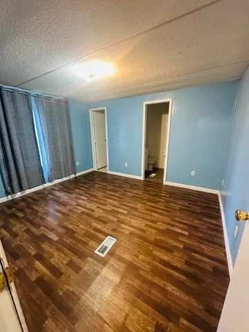 a view of a room with an empty space