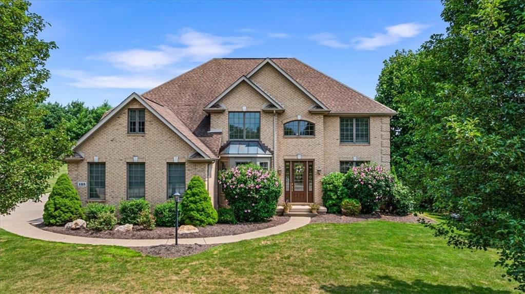 185 Pinkerton Road Wexford, PA 15090 - Photo 1 of 40 a front view of a house with a yard