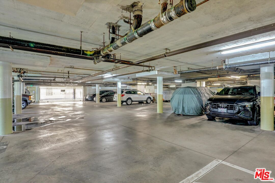 645 Chestnut Avenue, Unit 316 Long Beach, CA 90802 - Photo 22 of 24 a view of parking garage with cars