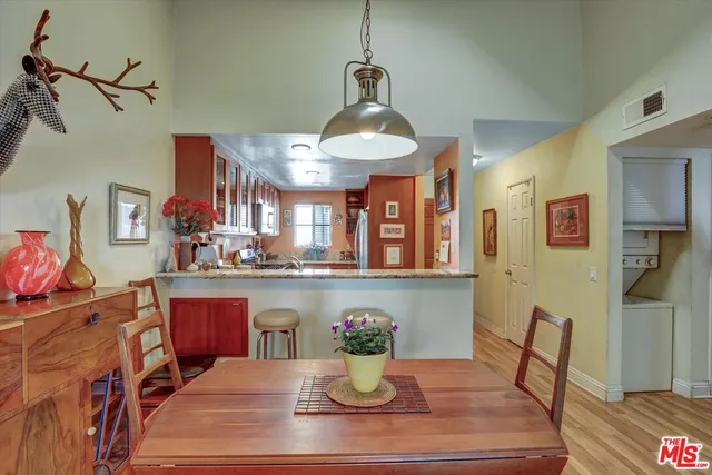 a view of a dining room with furniture