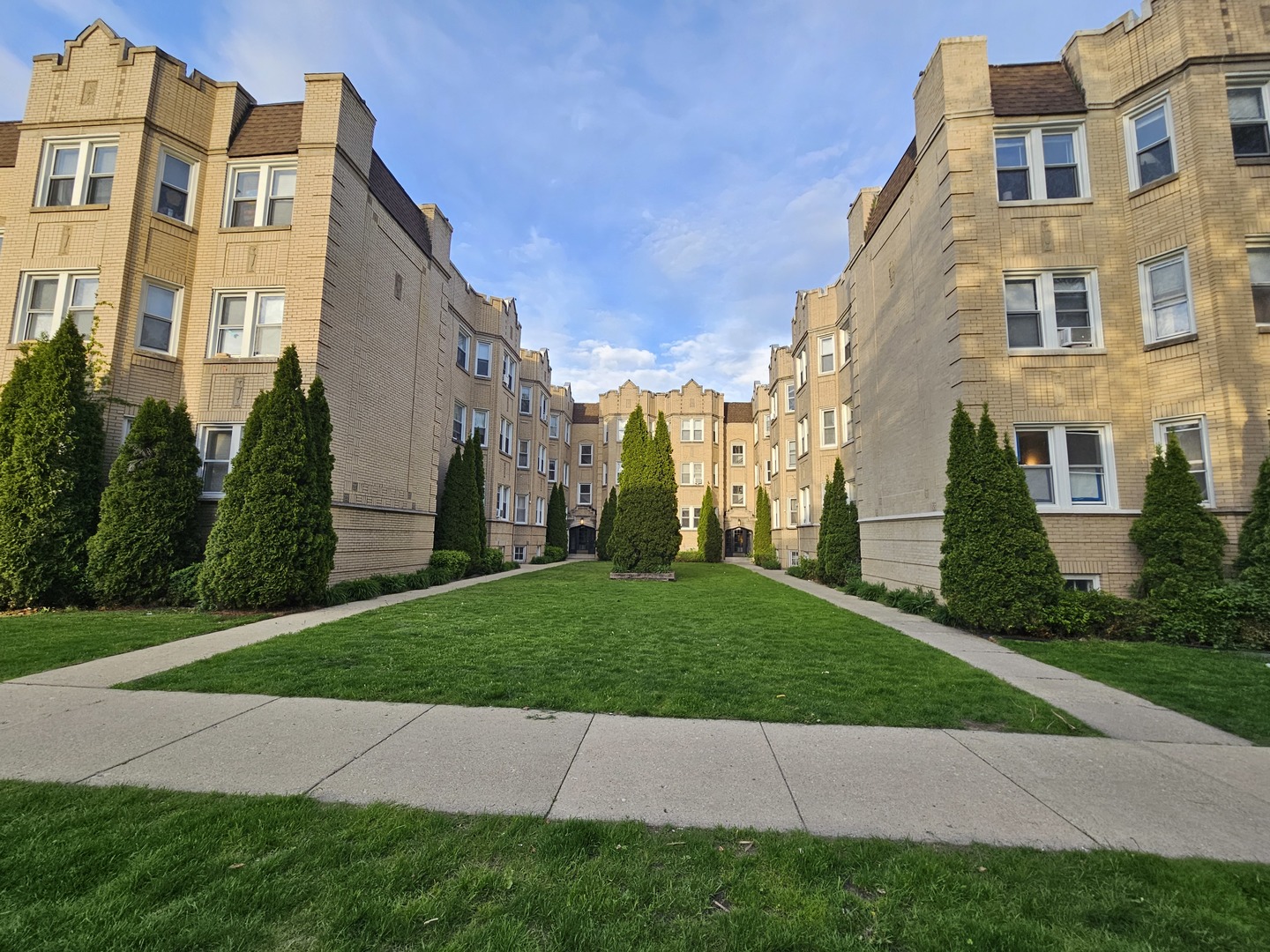 6551 North Francisco Avenue, Unit 3B Chicago, IL 60645 - Photo 1 of 15 a view of a building with a yard