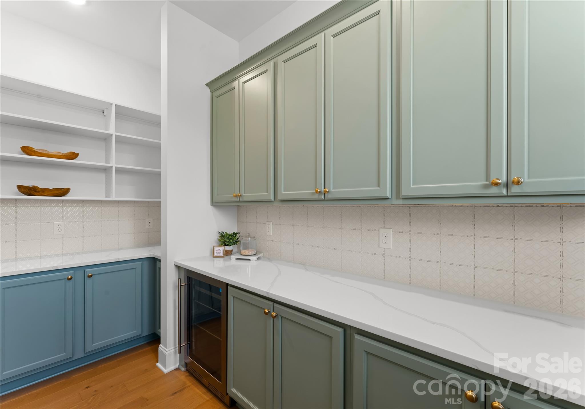 121 Vella Drive Locust, NC 28097 - Photo 14 of 46 a kitchen with stainless steel appliances white cabinets and a sink
