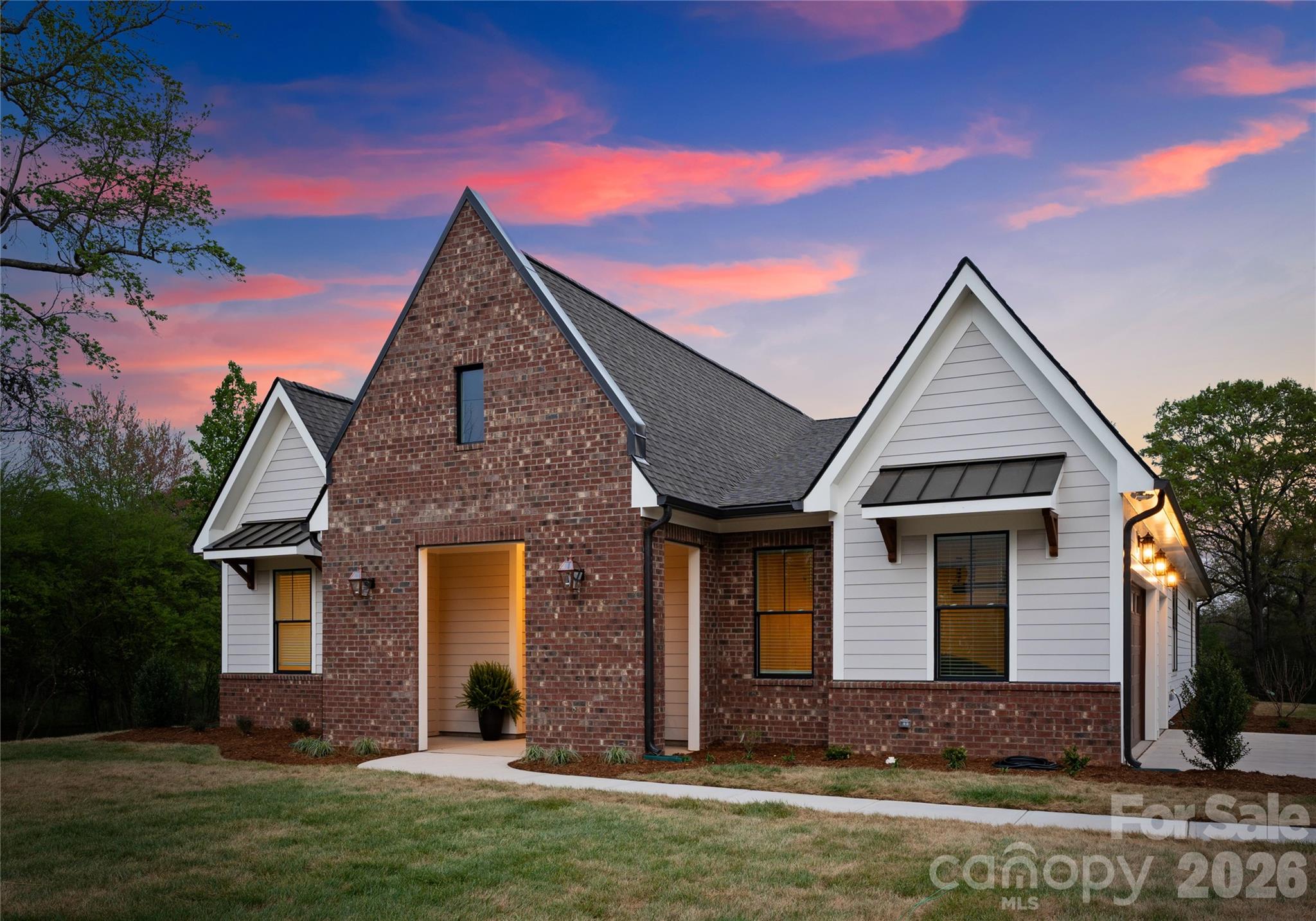 121 Vella Drive Locust, NC 28097 - Photo 2 of 46 front view of a house with a yard