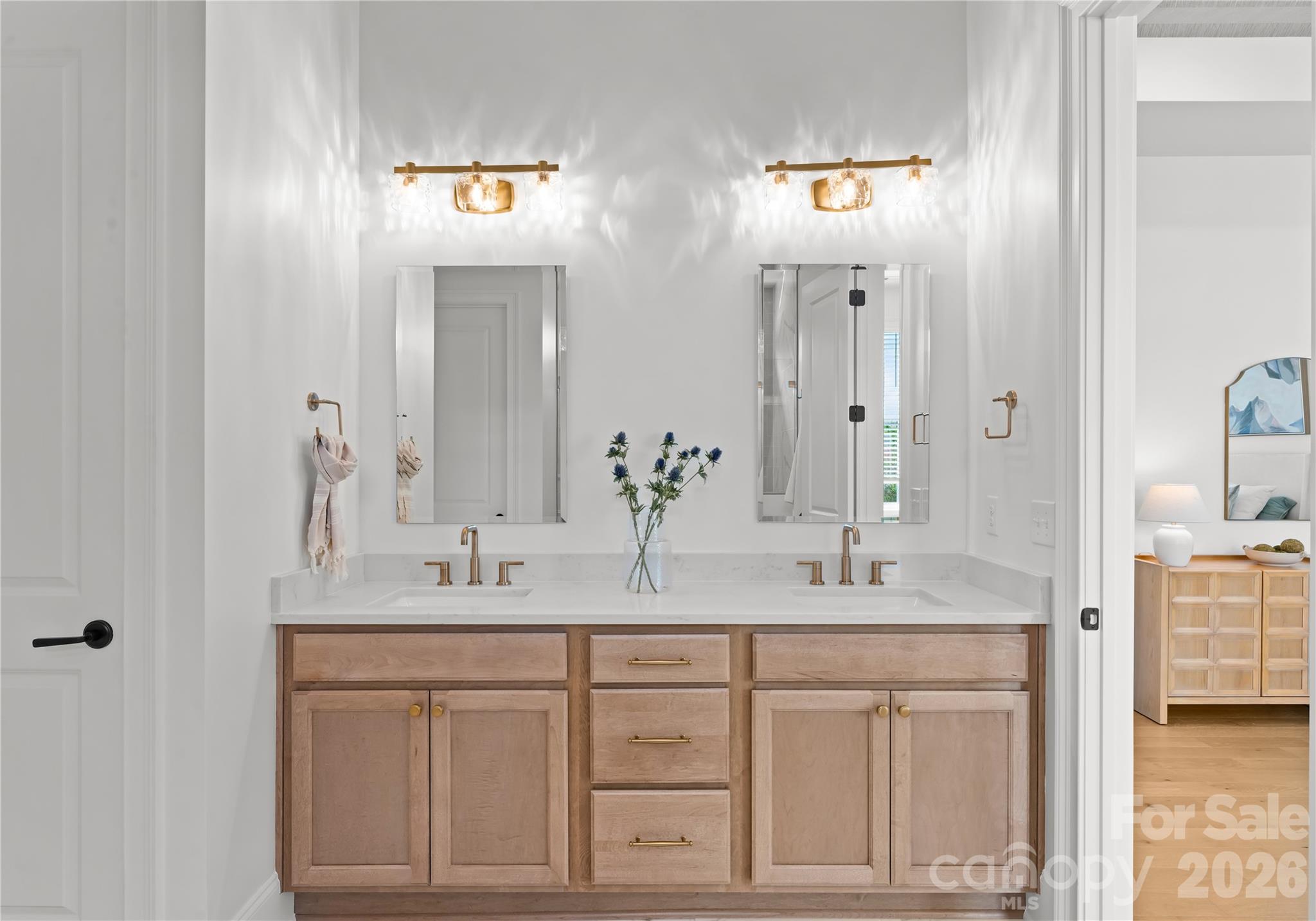 121 Vella Drive Locust, NC 28097 - Photo 27 of 46 a bathroom with a sink and a mirror